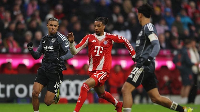 Kane double sends Bayern nine points clear after late Frankfurt scare