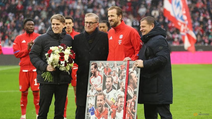 Kane double sends Bayern nine points clear after late Frankfurt scare