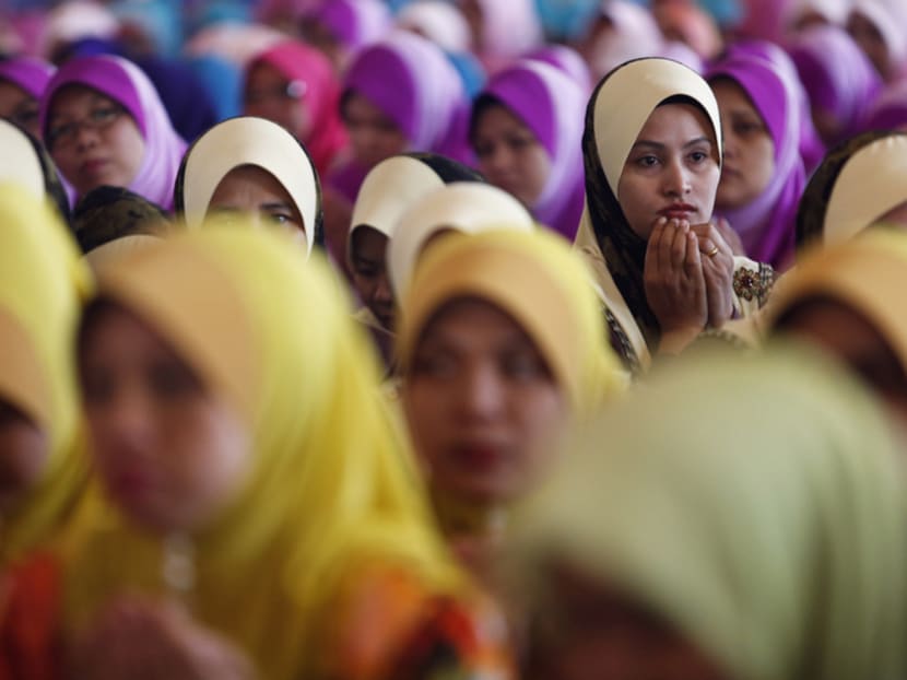 In Malaysia, marital rape is not a legal offence, but a husband may be prosecuted and imprisoned for a term of up to five years for forcing his wife to have sex by threatening violence or harming her. Photo: Reuters