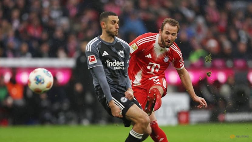 Kane double sends Bayern nine points clear after late Frankfurt scare