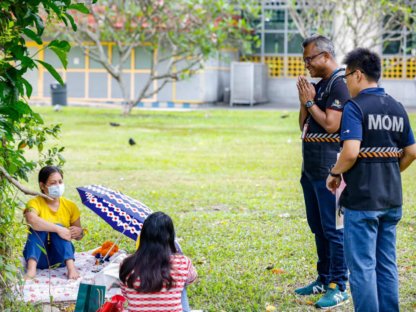 MOM officers speaking with migrant workers. Officers have been engaging with foreign workers over the past three weekends, to encourage them to stay home on their rest days as much as possible and avoid congregating. MOM officers speaking with migrant workers. Officers have been engaging with foreign workers over the past three weekends, to encourage them to stay home on their rest days as much as possible and avoid congregating.