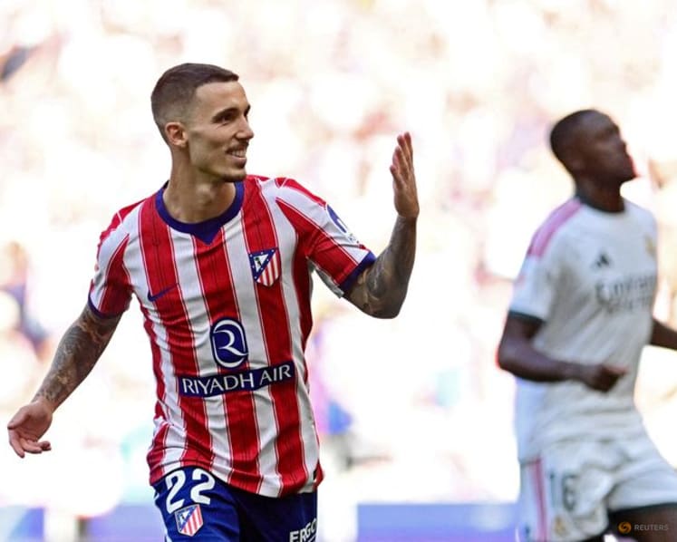 Atletico ride derby storm to beat 10-man Real Madrid 2-1