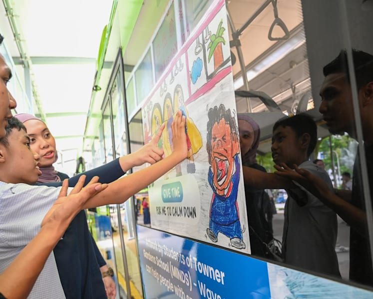 ‘No need to be harsh’: Public buses feature artwork by students with intellectual disabilities to fight stigma 