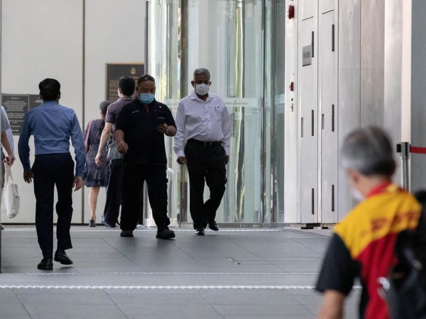 Office workers in the Central Business District at Raffles Place on Sept 22, 2021.