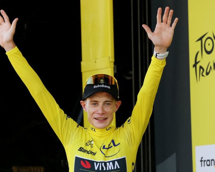 Vingegaard closes difficult chapter as he dons Tour yellow jersey
