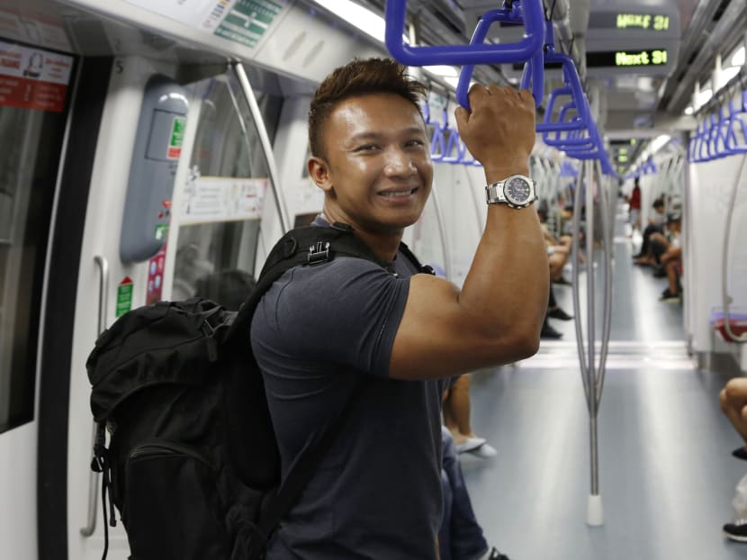 Kasbani Kasmon, 28, is a co-owner of a gym in Chua Chu Kang. He typically ends work at 9pm, but spends about 1 ½ hours training before taking the last train back to his in-laws' home in Punggol. Photo: Raj Nadarajan/TODAY