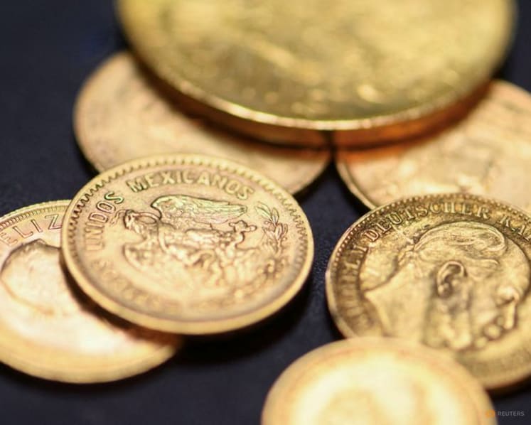 Gold dives to four-month low as inflation pressures lift rate hike bets