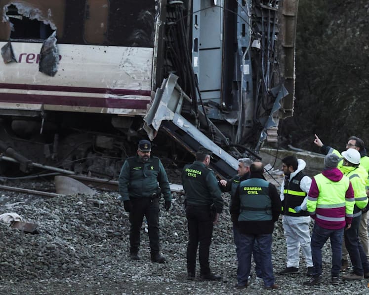 Spain deploys heavy machinery to find missing bodies among train crash wreckage