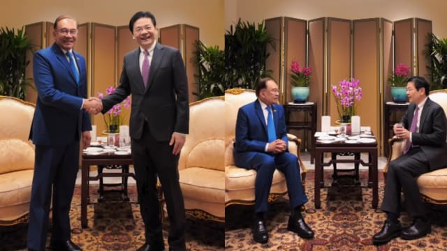黄总理为马国首相安华举行茶会 对区域和国际发展交换意见