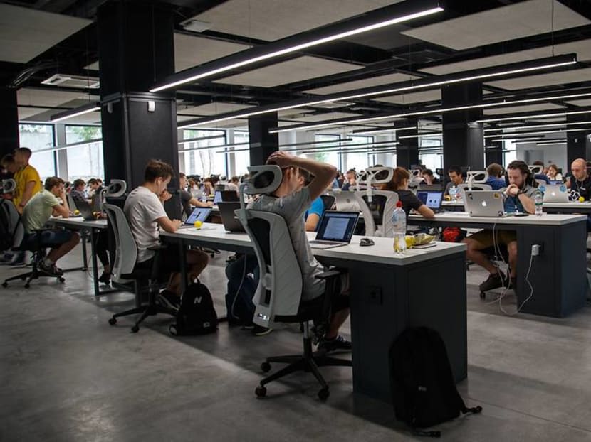 Commentary: Why are we all working so hard if it isn't making us richer?