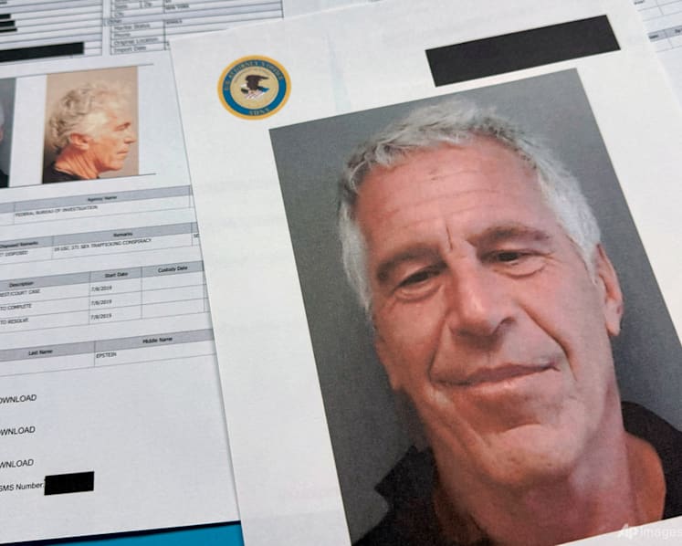 US Justice Dept releases documents, images, videos from Epstein files