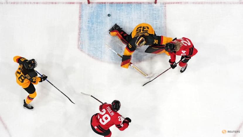 Ice hockey-Canada into semis, with Poulin back from injury and equalling scoring record