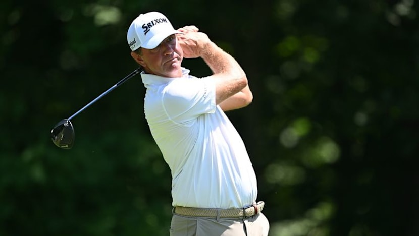 Glover says mid-round shoe removal about spike marks, not AimPoint protest