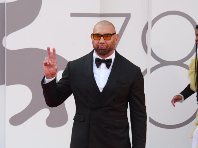 Dave Bautista thinks he wasted a lot of his money when he first found fame.