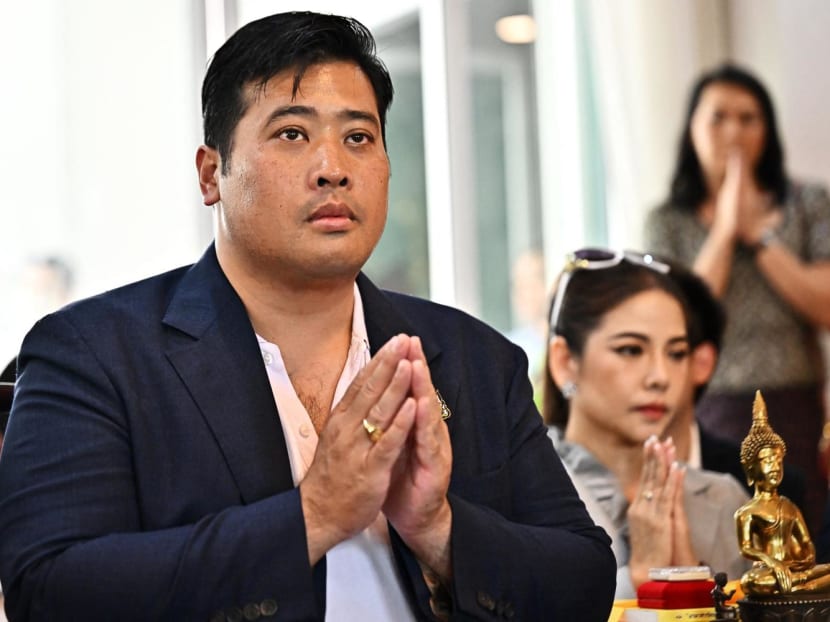 Vacharaesorn Vivacharawongse, the second-eldest son of Thai King Maha Vajiralongkorn, prays during a merit-making ceremony at Wat Yannawa Buddhist temple in Bangkok on Aug 10, 2023.