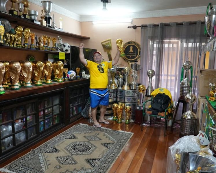 In Rio, artisan crafts World Cup trophies while hoping Brazil gets a real one