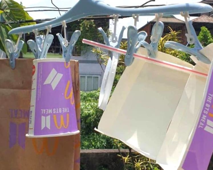 Malaysian fans wash, dry and enshrine packaging of McDonald's BTS Meal