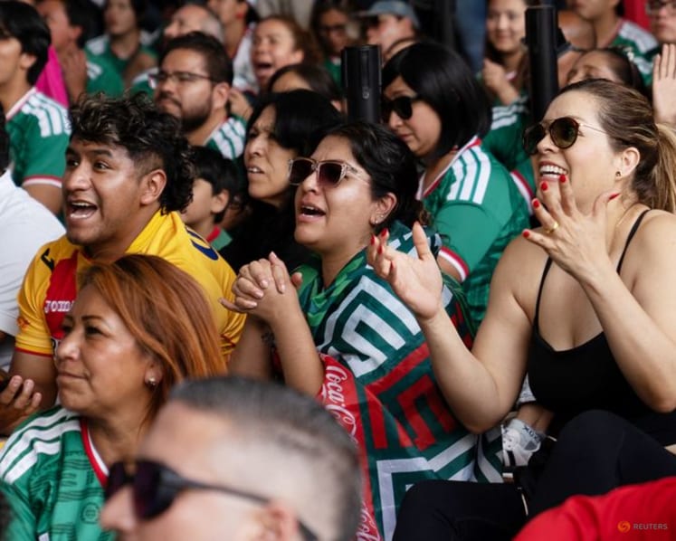Mexicans celebrate breaking opening day curse with 2-0 win