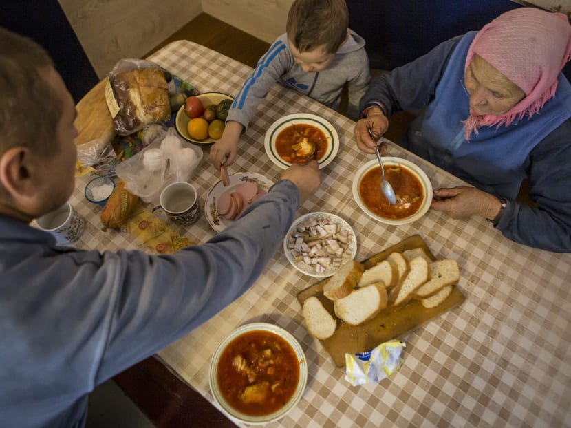 Ms Olha Habro, 76, serves borscht in Borshchiv, Ukraine on Oct 22, 2020. A Ukrainian chef supported by the Ministry of Culture and Parliament is trying to set the record straight with an application to the United Nation’s cultural body, Unesco, to list borscht as an intangible part of Ukraine’s cultural heritage.