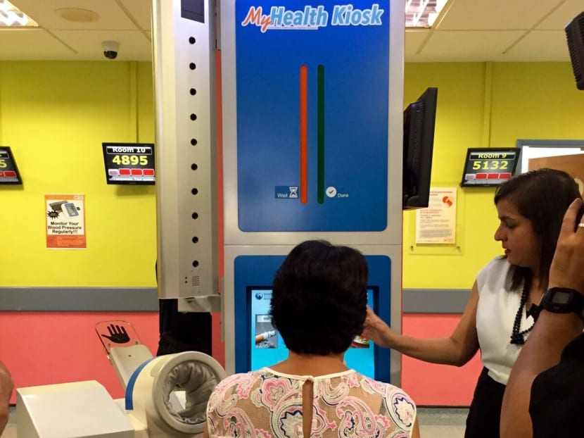 At the kiosk, patients have their blood pressure, height and weight taken, and their conditions assessed via a customised questionnaire. Photo: Tan Weizhen At the kiosk, patients have their blood pressure, height and weight taken, and their conditions assessed via a customised questionnaire. Photo: Tan Weizhen
