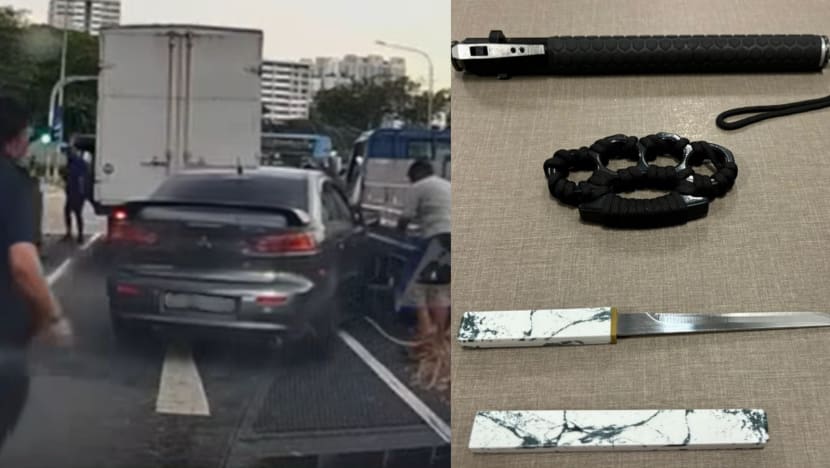 Driver arrested after attempting to force his way out of traffic in Marsiling; weapons found in his car Driver arrested after attempting to force his way out of traffic in Marsiling; weapons found in his car