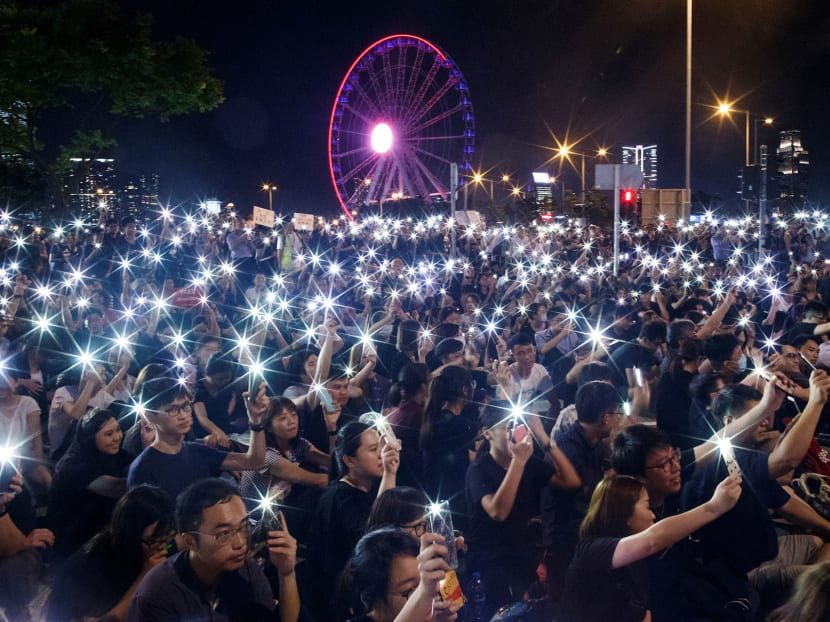 Despite assurances from Beijing that political freedoms would not be hindered, many Hong Kongers moved to delete digital references of their opposition to China's ruling Communist Party, which uses similar laws on the mainland to crush dissent.