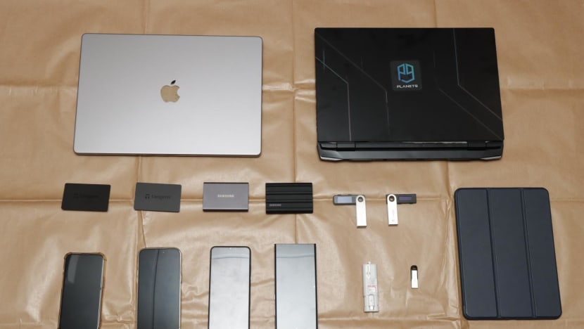 Fresh charges for 5 men with suspected links to global syndicate involved in 'malicious cyber activities'