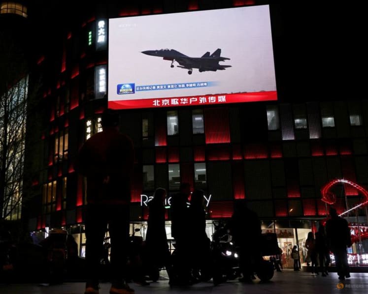Ahead of Trump-Xi meeting, China says bombers flew near Taiwan