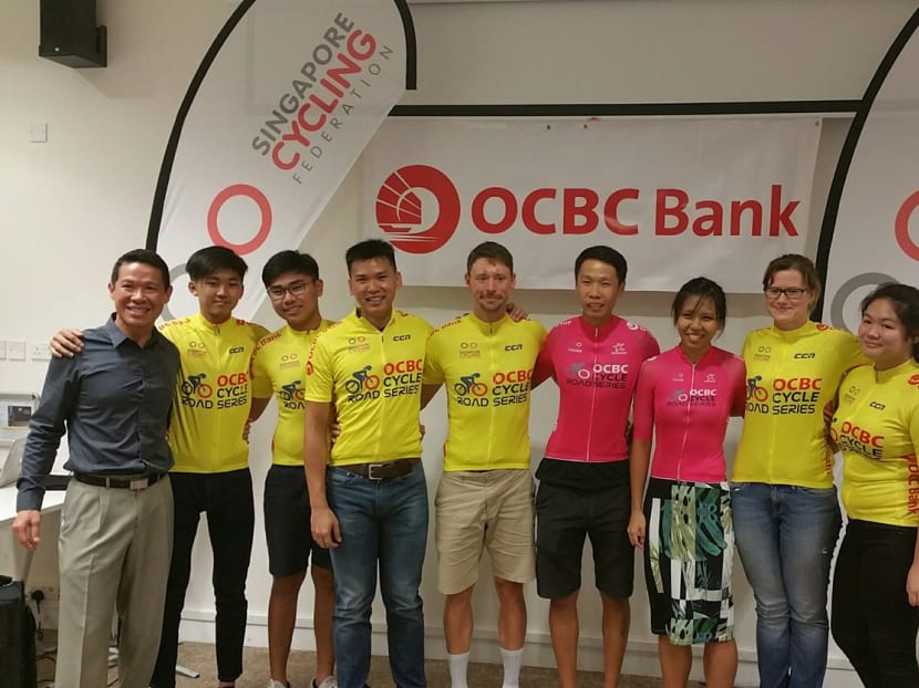 Apart from nine yellow jersey winners, Ho Jun Rong (sixth from left) and Luo Yiwei were awarded pink jerseys for winning the men’s and women’s open at the OCBC Cycle Road Series (2016). Photo: Low Lin Fhoong