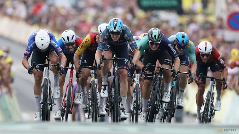 Triple stage winner Merlier exits Tour de France in stage 15
