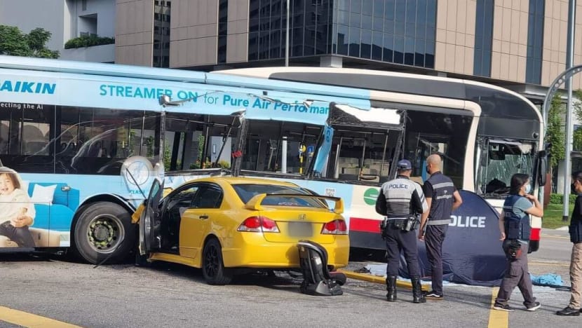 2 dead after car and bus collide at Woodlands junction 2 dead after car and bus collide at Woodlands junction