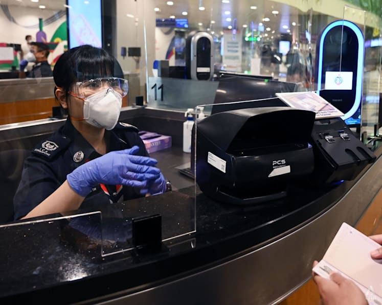 More than just scanning passports: On duty at Changi Airport with an ICA officer