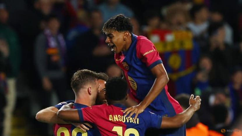 Olmo strikes to keep Barca's title charge on track