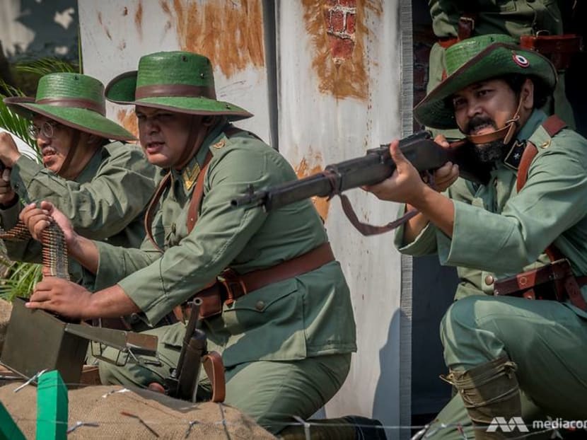 Wooden swords and replica rifles: History buffs in Indonesia recreate battles to honour national heroes