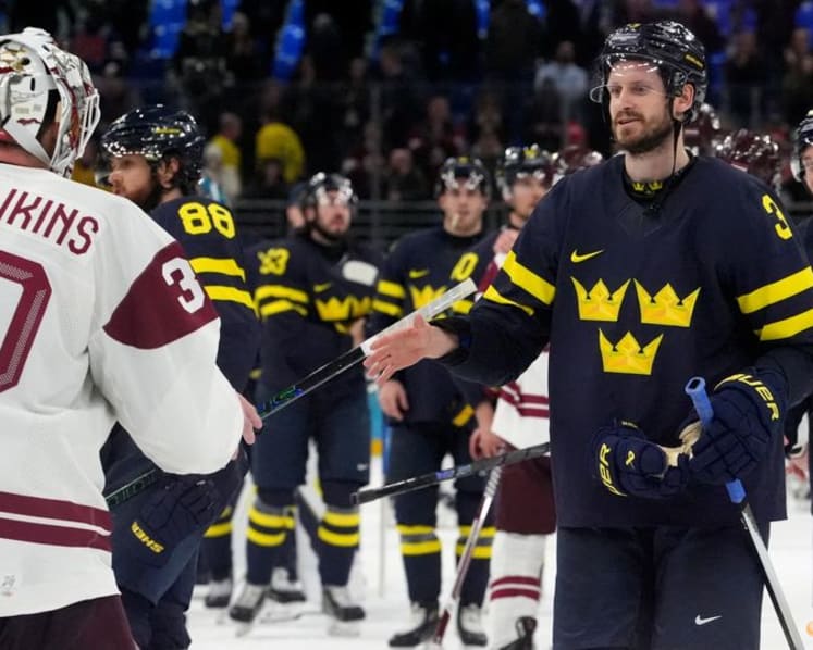 Ice hockey-Sweden beat Latvia to set men's quarter-final meeting with US