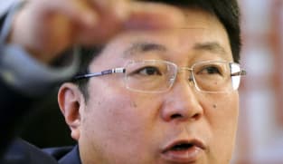 China hands suspended death sentence to ex-chief of state chip giant