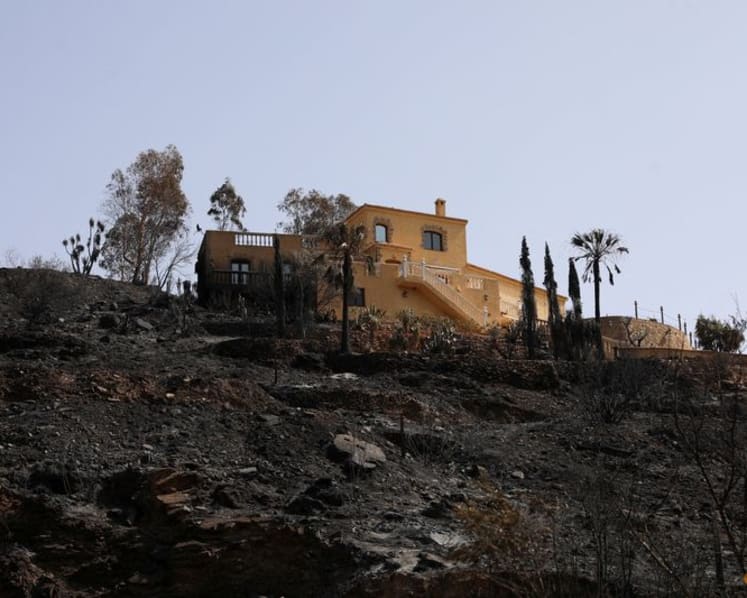 Firefighters gain upper hand on deadly Spain wildfire