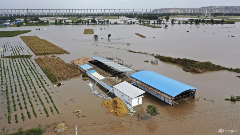 Bus plunge, floods leave at least 28 dead in northern China