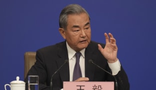 China urges end to 'illegal' sanctions as it hosts Iran nuclear talks