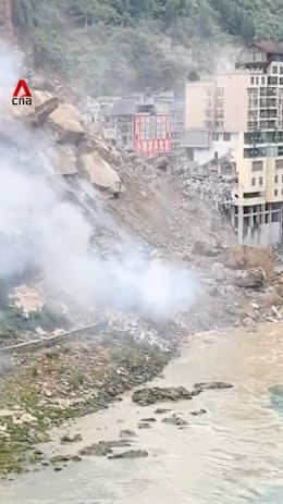 Several trapped as residential buildings collapse in  Chongqing landslide