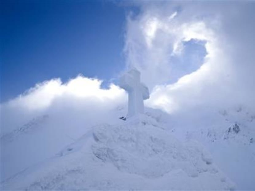 Romanian mountain Ice Church draws all types of Christians