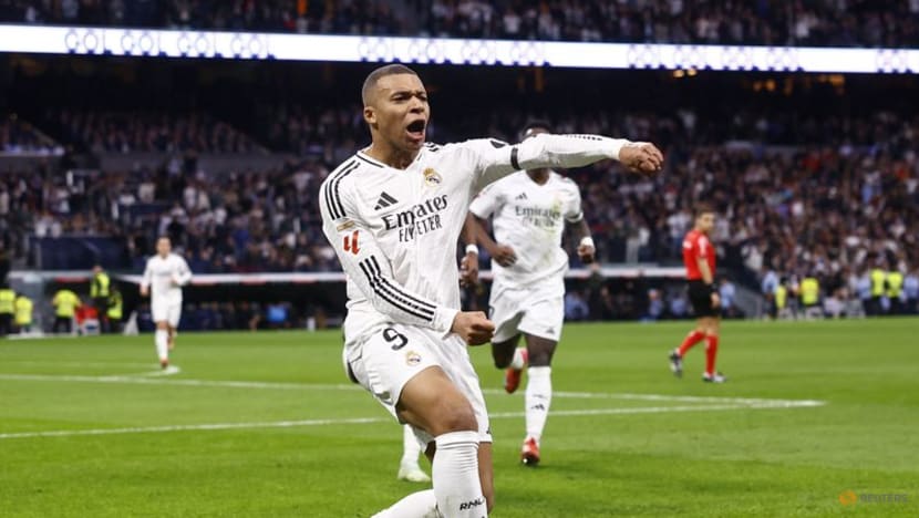 Real Madrid maintain pressure in title race after easy win over Rayo Vallecano