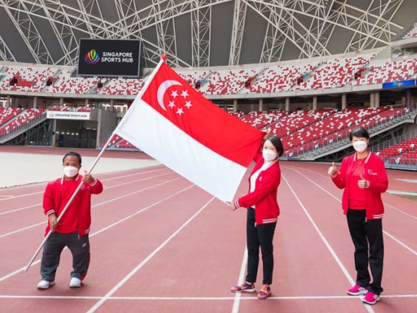 (From left) Minister for Culture, Community and Youth Edwin Tong, flagbearer Muhammad Diroy Noordin, chef de mission Shirley Low and Singapore National Paralympic Council chairperson Teo-Koh Sock Miang.