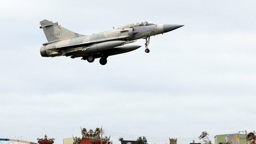 Taiwan stays on high alert as Chinese ships pull back after massive drills