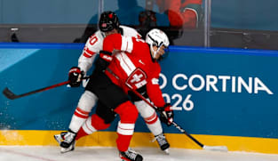 Ice hockey-Canada glad to get on the ice and happy with high shot count
