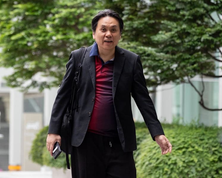 Raymond Ng charged with cheating 12 people over vending machine business