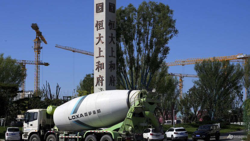 China tries to reassure on Evergrande as default fears rise