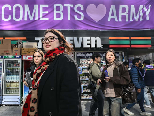 Tickets to toothbrushes: Can the BTS money-making machine beat Taylor Swift?