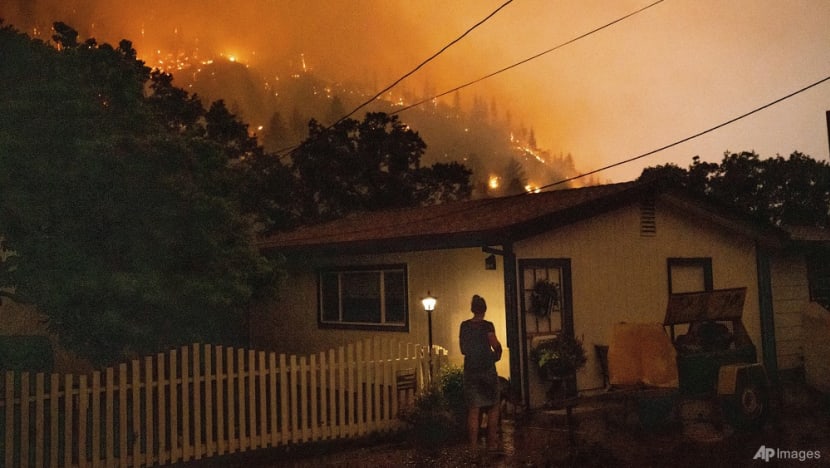 Heat, wind threaten to whip up growing western US wildfires