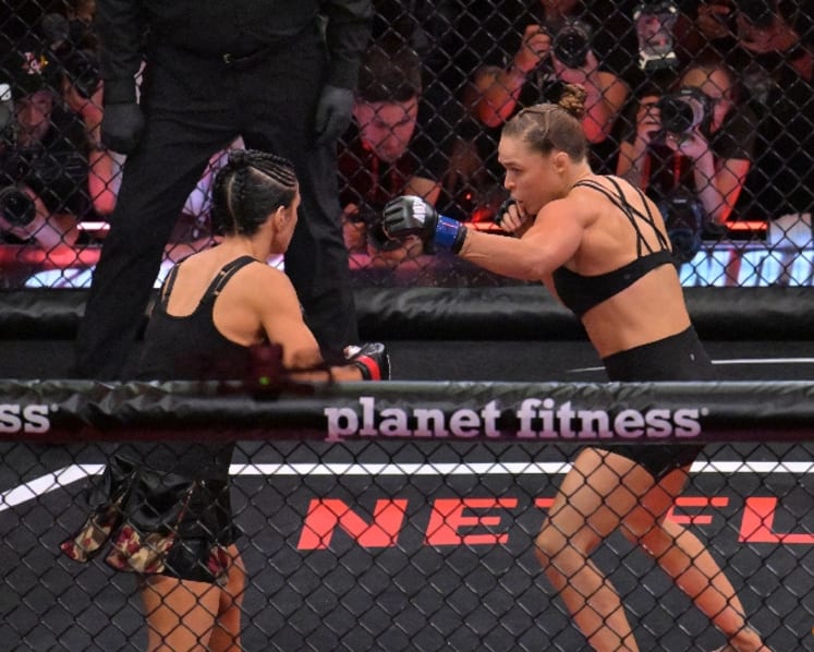 Rousey rolls back the clock to submit Carano in 17 seconds